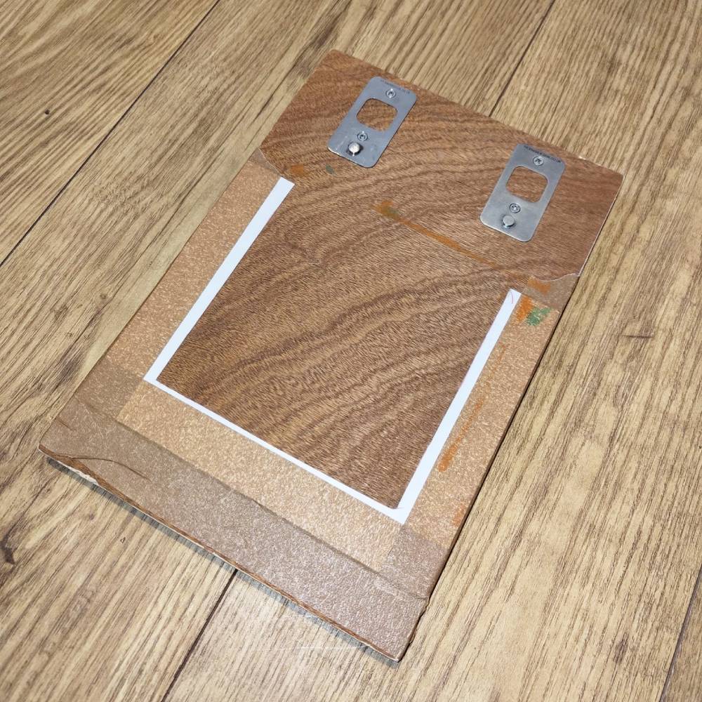 Frame made from card to place lino block into to stop movement