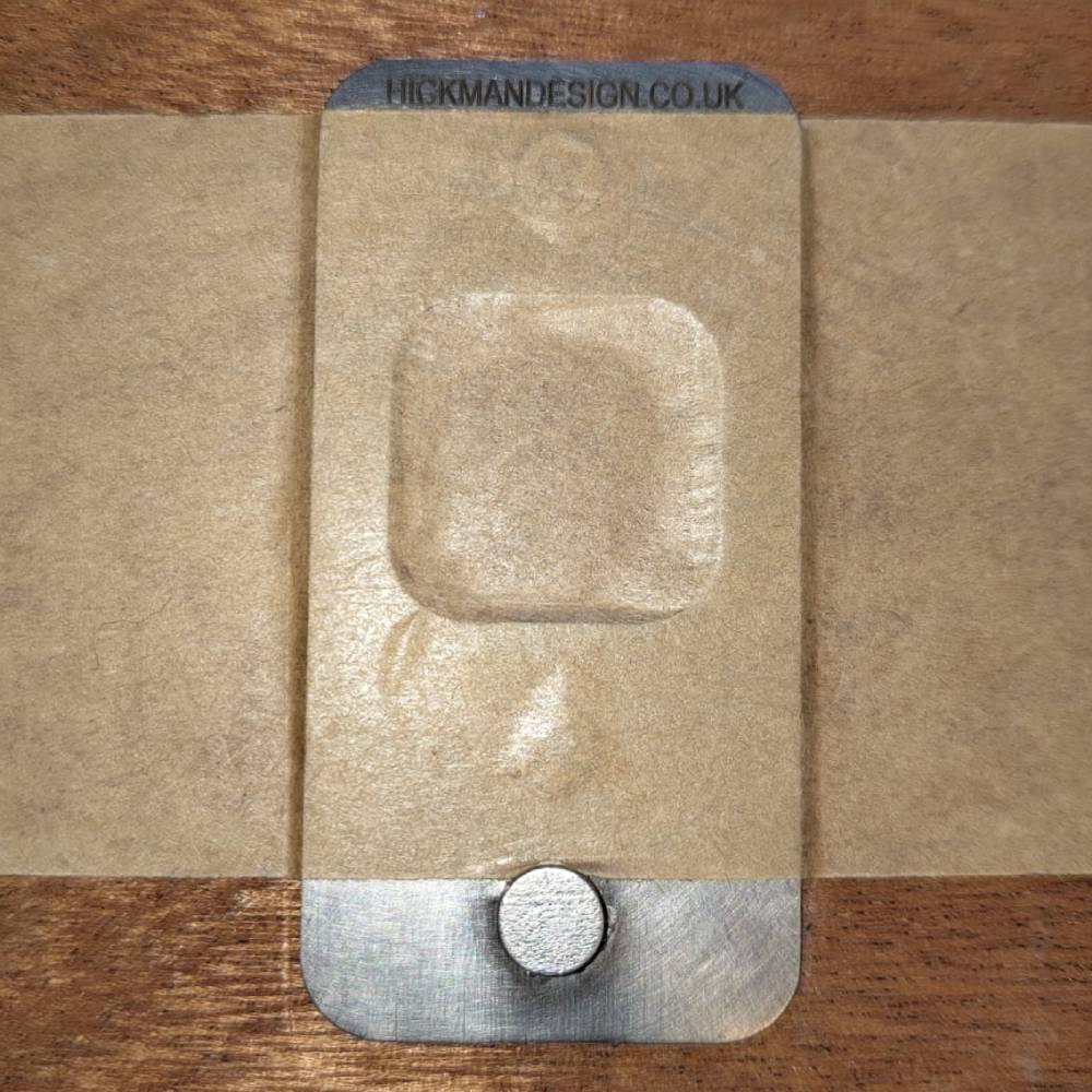 Registration pins taped down