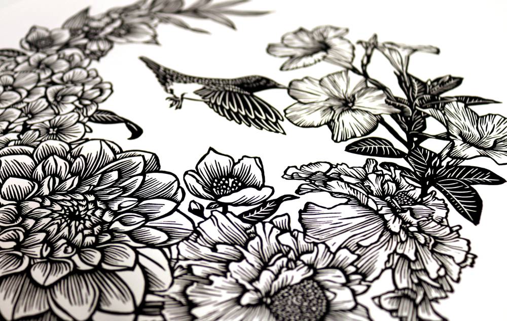 A black-and-white linocut detail of a hummingbird flying between large flowers and leaves.