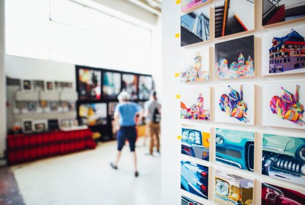 Colourful prints displayed at a print fair