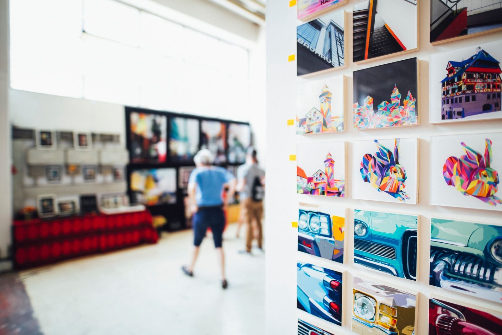 Colourful prints displayed at a print fair